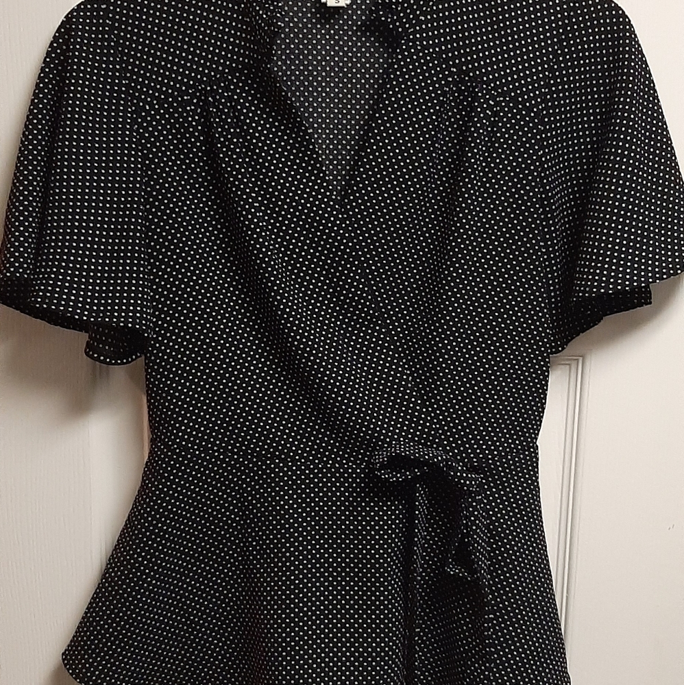 Polka dot peplum top